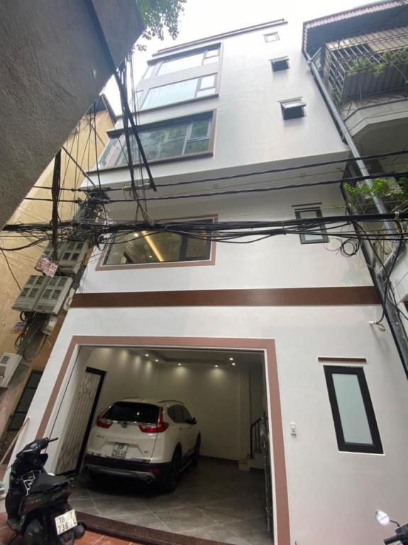 Bán nhà phố Đội Cấn, Ba Đình, thang máy, ô tô vào nhà, tiện KD, 6 tầng 38 m2 giá 10.2 tỷ