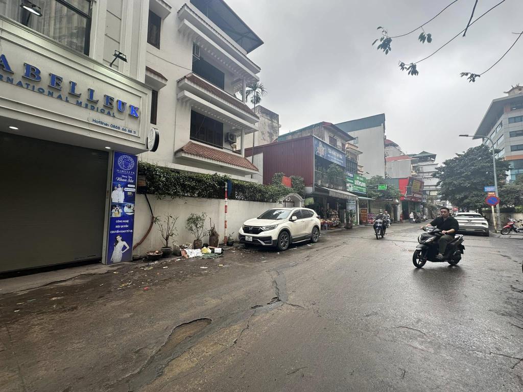 Bán toà 7 tầng phố Hoàng Cầu 65m2, 3 ô tô tránh kinh doanh gần Hồ Hoàng Cầu giá 38 tỷ
